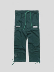 PANTALONE COMME des FUCKDOWN PANTALONE CON NERVATURE E STAMPA • VERDE