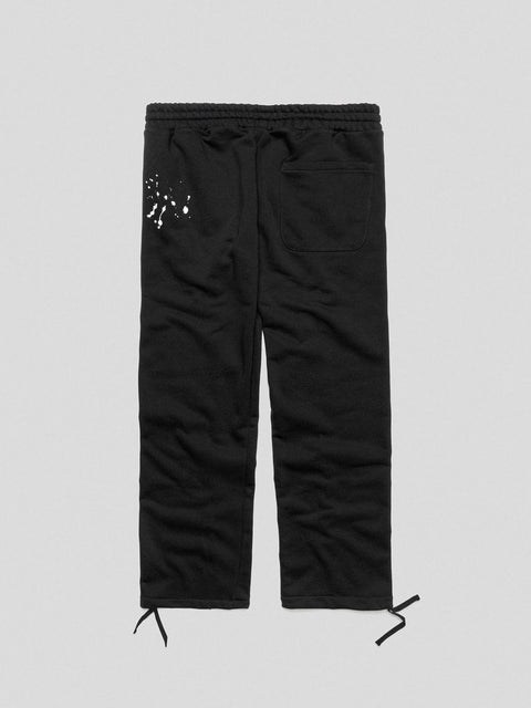 COMME des FUCKDOWN PANTALONE CON NERVATURE E STAMPA • NERO